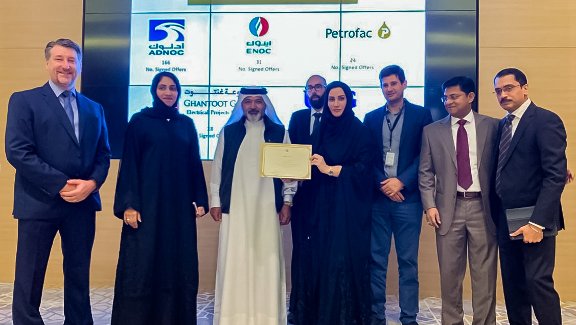Petrofac employees receiving the Emiratisation award at a ceremony in Dubai